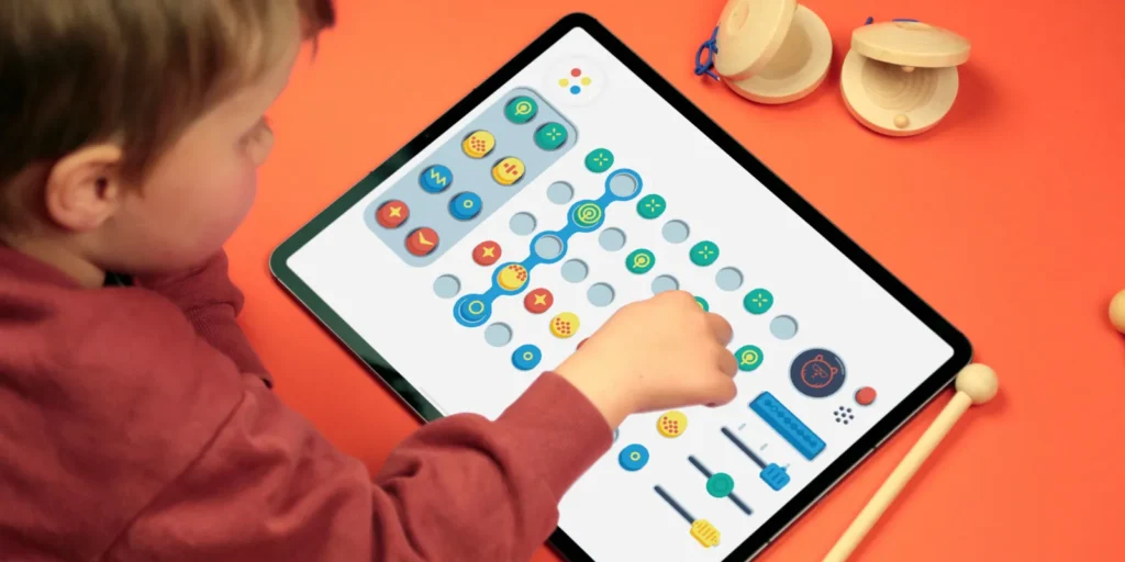 a child using a tablet to create music